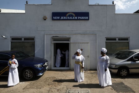 Worshippers leave after Sunday service at the New Jerusalem Parish