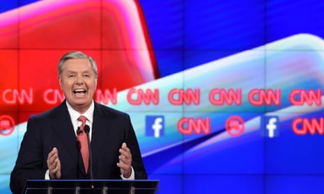 Republican Presidential candidate Lindsey Graham gestures on stage during the under card Republican Presidential debate, hosted by CNN, at The Venetian hotel in Las Vegas, Nevada on December 15, 2015. AFP PHOTO / ROBYN BECKROBYN BECK/AFP/Getty Images