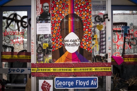 A bus stop in Minneapolis is part of a memorial to George Floyd.