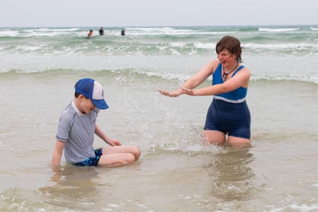 Annie and Ezra playing in the sea.