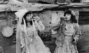 The bride and bridesmaid during a wedding celebrations in Fakulteta, a Gypsy district of Sofia, Bulgaria, 1991See more on this picture - link Sunday 17th big pic piece https://www.theguardian.com/theobserver/series/the-big-picture