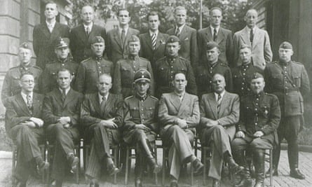 Members of the Arājs Kommando unit during training in Germany. The leader, Viktors Arājs, is pictured on the bottom row, second from the left. The author’s grandfather, Boris Kinstler, is in the centre of the top row.