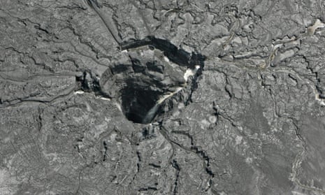 An aerial photo shows the sinkhole on Friday.