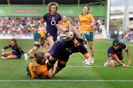Abi Burton goes over to score England’s first try.