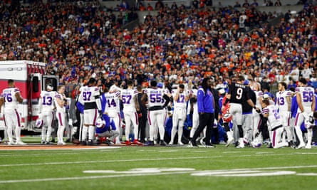 Buffalo Bills and Cincinnati Bengals gather around Damar Hamlin after his collapse. Jessica Pegula was touched by the global response.