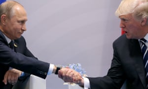 Trump shakes hands with Putin during the their bilateral meeting at the G20 summit in Hamburg, Germany on 7 July 2017. 