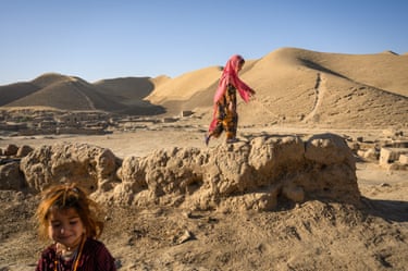 Two girls playing in the desert