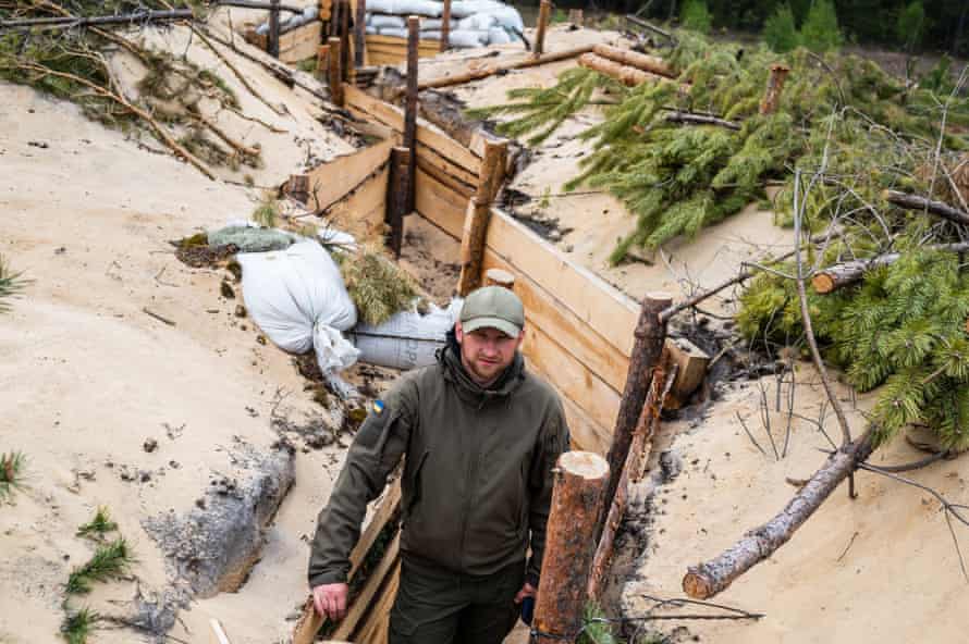 Serviceman Vitaliy in a trench north of Zhytomyr region.