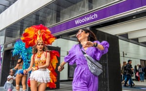 London, England. Samba dancers outside Woolwich station celebrate the opening of the Elizabeth Line