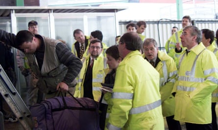 Jack Straw (right) in 2000, then the home secretary, watches as a stowaway is helped down from a lorry at Dover docks.