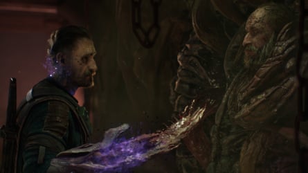 A man’s hand glows with purple energy as a bloodied creature’s claw reaches toward a bearded figure