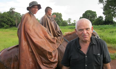 Edward Luttwak with Bolivian cowboys dressed in their natural latex ponchos.