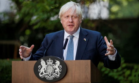 A picture of Prime Minister Boris Johnson hosting a reception in the garden of 10 Downing Street on 9 August.