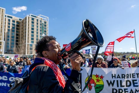 Free DC Activists start the march across the Fredrick Douglas Memorial Bridge on March 28, 2026 in Washington, DC.