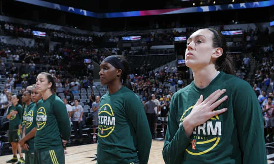 The Seattle Storm stand for the national anthem on 8 July 2016 at the AT&amp;T Center in San Antonio, Texas. 