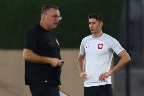 Poland manager Czesław Michniewicz (left) and Robert Lewandowski at Poland training yesterday.