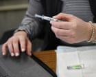 US medical groups urge people to get flu and Covid shots in counter to Trump guidance