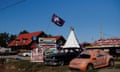 Signs and flags are seen on the property of William Denby, Ontario, Canada on April 25, 2024. (Cole Burston)