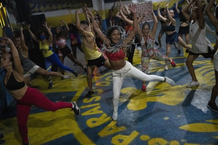 Foreigners and Brazilians practice with the Paraiso de Tuiuti samba school in Rio de Janeiro on 3 February
