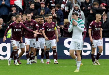 Heart of Midlothian’s Lawrence Shankland (third right) celebrates after scoring his sides third goal during the William Hill Premiership match at Tynecastle Park, Edinburgh.