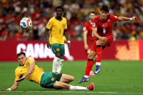 Arda Guler #8 of Turkiye shoots while Paul Okon-Engstler #24 of Australia attempts to block