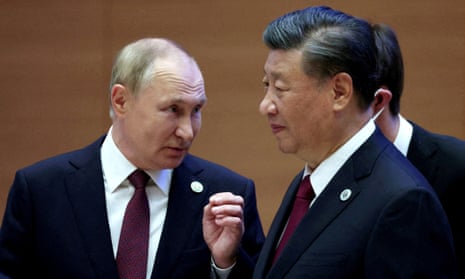 Vladimir Putin with Xi Jinping in Uzbekistan last September.