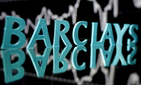The Barclays logo is seen in front of displayed stock graph