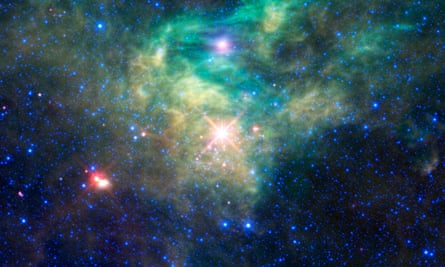 An image taken by Nasa’s Wide-field Infrared Survey Explorer, or Wise telescope, which has surveyed asteroids, of newborn stars in the constellation Camelopardalis.