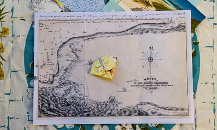 Old map, folded paper flower