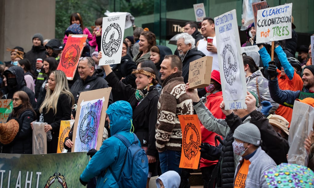 Members of the Nuchatlaht First Nation and supporters rally outside B.C. supreme court before the start of an Indigenous land title case, in Vancouver, on 21 March 2022. 