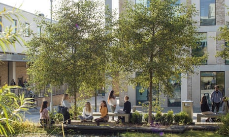 Students sit outside at Lancaster University.