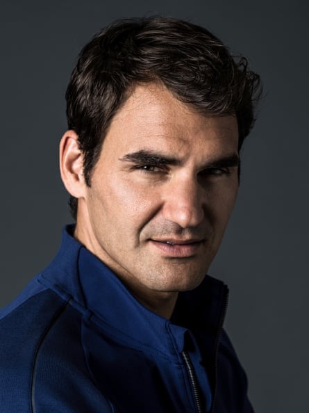 Tennis player Roger Federer wearing a jacket from his new clothing line for Nike