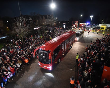 The Liverpool team bus arrives outside Anfield before the match against Sunderland.