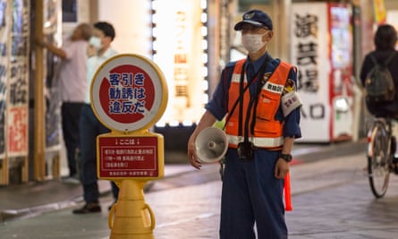 A security worker in Tokyo, Japan, this week