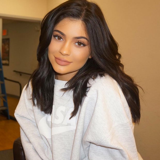 Kylie Jenner wearing a NASA sweatshirt in an Instagram selfie.