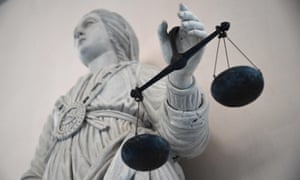 A statue of the goddess of justice balancing the scales at Rennes’ courthouse on 19 May 2015.