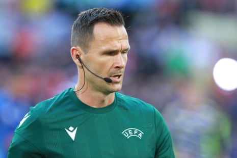 Slovakian referee Ivan Kruzliak leads today’s team of match officials