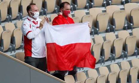 Fans hold up a Poland flag during the 2020 French Open final between Poland’s Iga Swiatek and Sofia Kenin of the U.S.