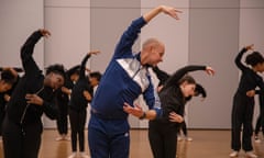 Martin Howland teaches children ballet in a school hall