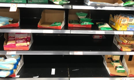 Partly empty shelves in a supermarket