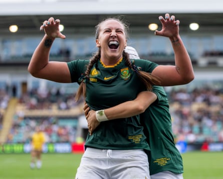 Libbie Janse van Rensburg celebrates after scoring a try for South Africa.