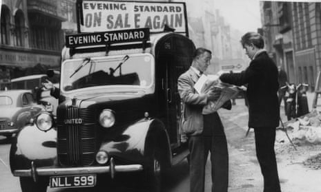 A vendor receiving deliveries of the Evening Standard as printing resumed after a strike on Fleet Street, 1955
