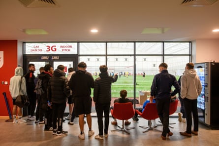 Students watch Newport County as they prepare for the FA Cup tie against Manchester United.