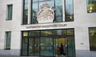 Two men in UK charged with spying for China