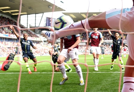 April 28: Matthew Lowton of Burnley fails to keep out an effort by Sergio Aguero of Manchester City.