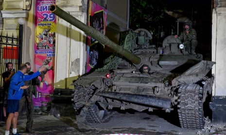 A local man chats with Wagner soldiers in Rostov.