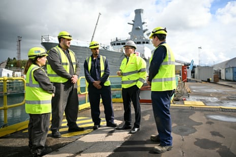 Keir Starmer speaking to apprentices during his visit to BAE Scotstoun shipyard in Glasgow.