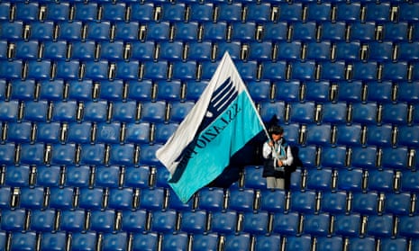 A young Lazio supporter amid empty seats at their 2-0 home win over Bologna – the last match they played before the Serie A shutdown.