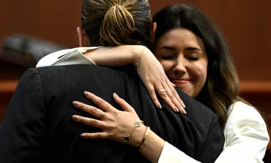 Camille Vasquez hugs her client Johnny Depp in a Virginia courthouse.