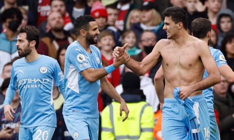 Manchester City's Rodri celebrates scoring their second goal with fellow goalscorer Riyad Mahrez.